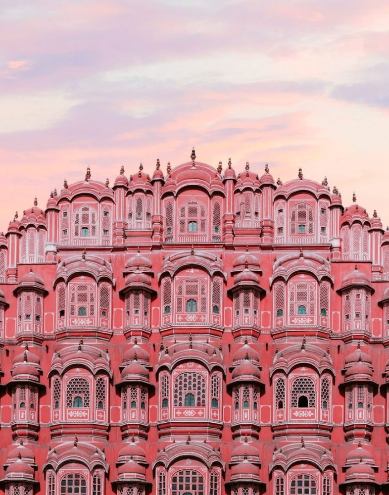 low angle view building against sky sunset min scaled 1